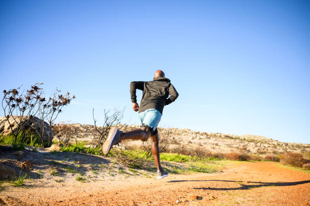 istock Fast runner on dirt road early morning in nature 2148684378