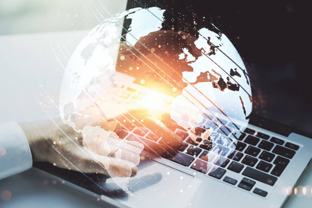istock Multi exposure of abstract creative digital world map and hands typing on computer keyboard on background, tourism and traveling concept 2148685528