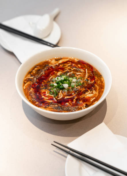 istock Chinese spicy mala noodle soup. Table meal in restaurant. 2148687906