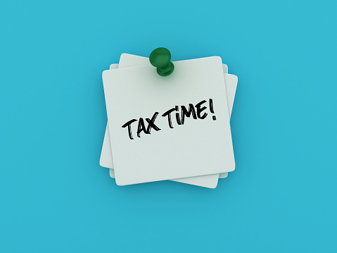 Sticky Note with Tax Time Phrase - Colored Background - 3D Rendering