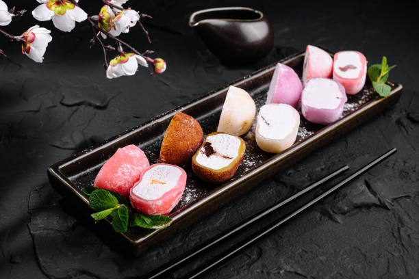 istock Assorted mochi ice cream on dark slate background 2148688629