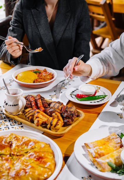 Friends enjoying a feast at a restaurant