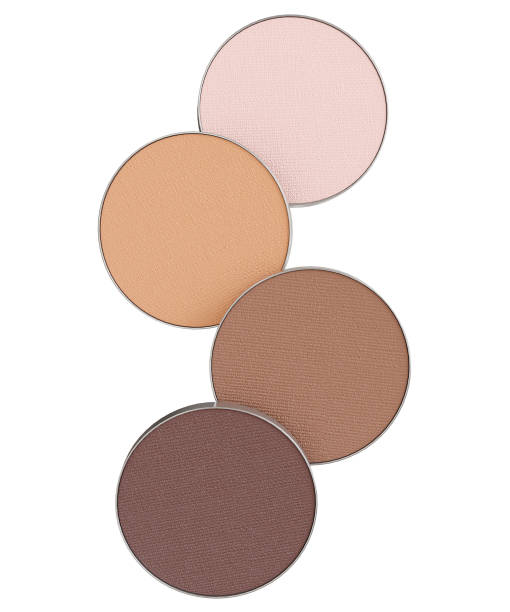 istock 3D rendering of four eyeshadow compacts with a range of brown hues 2148689864
