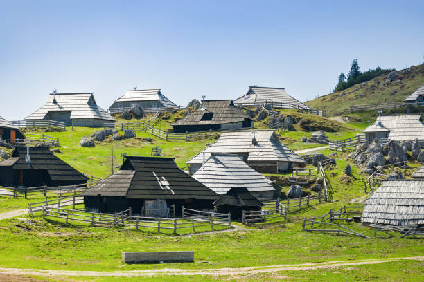 Small village in the Carnic Alps and the mountain peak of Osternig or Oisternig, Italy-Austria Border. Feistritz an der Gail municipality, Carinthia, Austria, central Europe.
