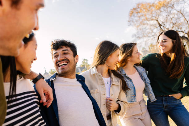 istock Happy friends enjoying together in a park 2148692228
