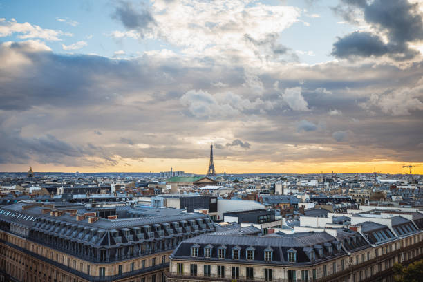 istock Paris cityscape and the Eiffel Tower under the overcast at dusk 2148692524