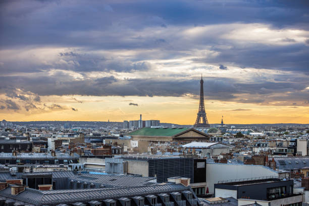 istock Paris cityscape and the Eiffel Tower under the moody sky at sunset 2148692543