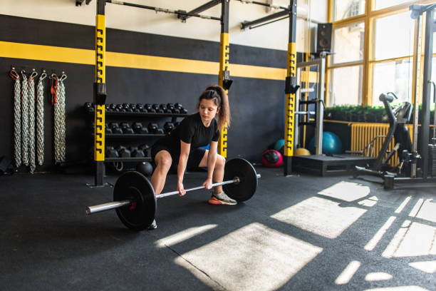 istock Strong woman weightlifting 2148692654