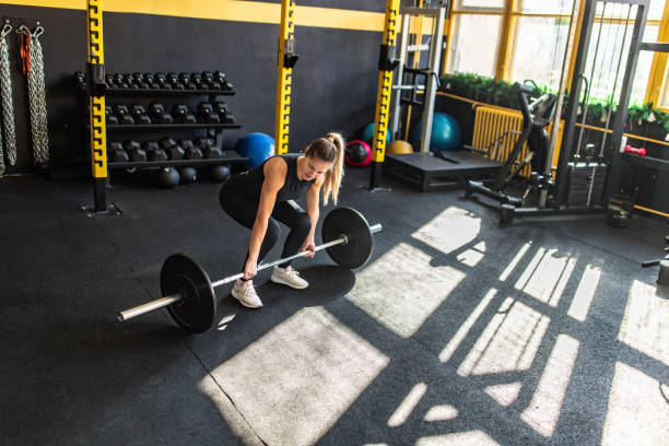 istock Strong woman weightlifting 2148692786