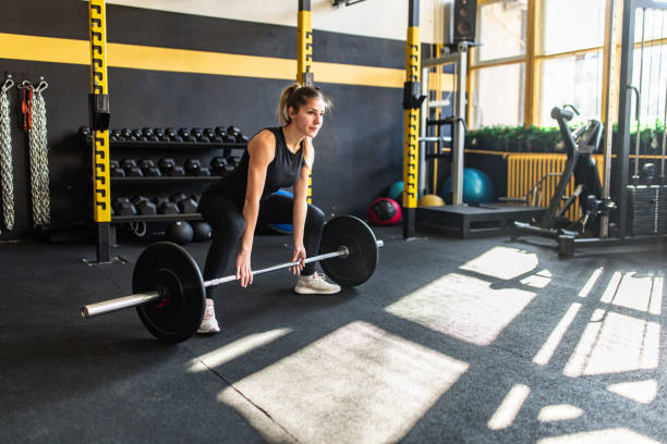 istock Strong woman weightlifting 2148692810