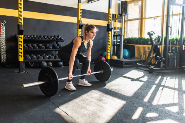 istock Strong woman weightlifting 2148692910