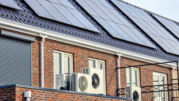 istock air source heat pump unit installed outdoors at a modern home with solar panels in the Netherlands 2148693487