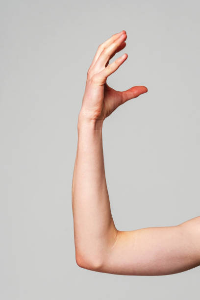 istock Elevated Bare Human Arm Bent at the Elbow Against a Neutral Background 2148695567