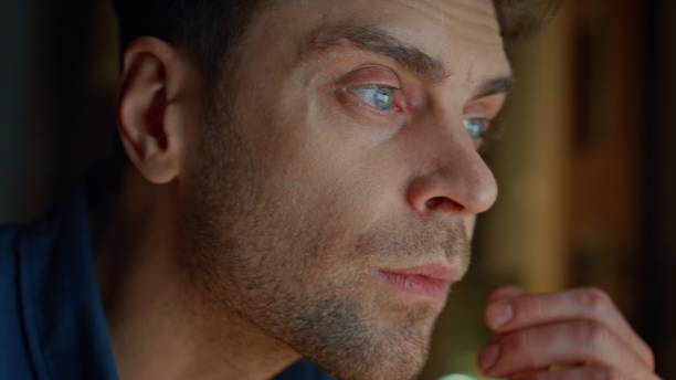 istock Focused man staring screen at night flat closeup. Guy hands typing keyboard 2148696835
