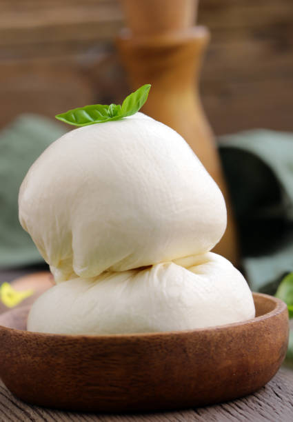 istock mozzarella cheese for salad with tomatoes and basil 2148698440
