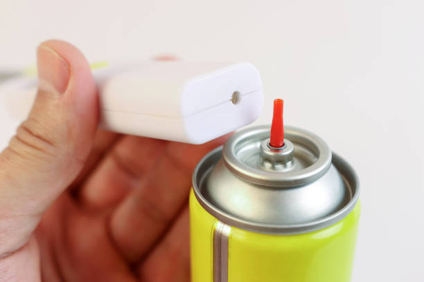 istock The gas lighter is filled with gas from a cylinder. 2148698690