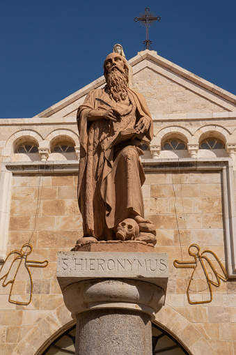 Statue of St. Hieronymus near the main entrance to the Church of Saint Catherine, Bethlehem. High quality photo