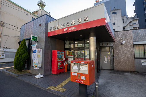 Nagoya, Japan - March 21, 2024 : Post Office in Nagoya, Aichi Prefecture, Japan. Japan Post offering postal and package delivery services, banking services and life insurance.