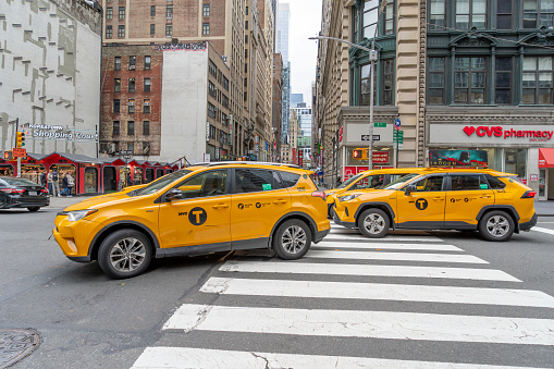 New York City - December 1, 2018: Taxi yellow cabs in Times Square