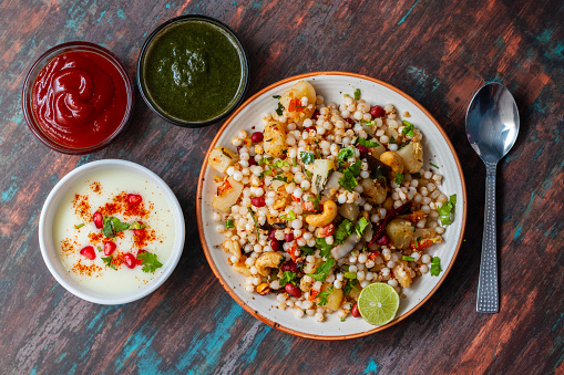 Sabudana Khichdi is a gluten-free Indian dish made with soaked tapioca pearls, potatoes, peanuts, and spices. It’s popular during fasting days.