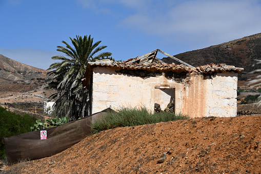 Betancuria, Fuerteventura, Spain, February 27, 2024 - Deserted farmhouse in the dry volcanic landscape of Fuerteventura, Canary Islands