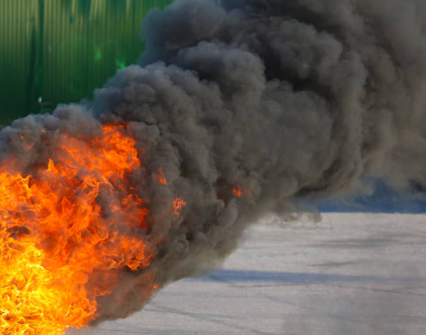 istock A flame of fire with black smoke from a burning tire 2148706605