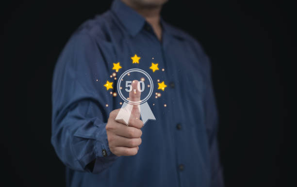 istock Concept of guarantee standards iso certification and standardization service quality and assurance : Businessman Is using finger touching for certify with five star after he has verified it. 2148706988