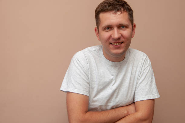 istock Young man in a grey T-shirt. Happy lifestyle. 2148707516