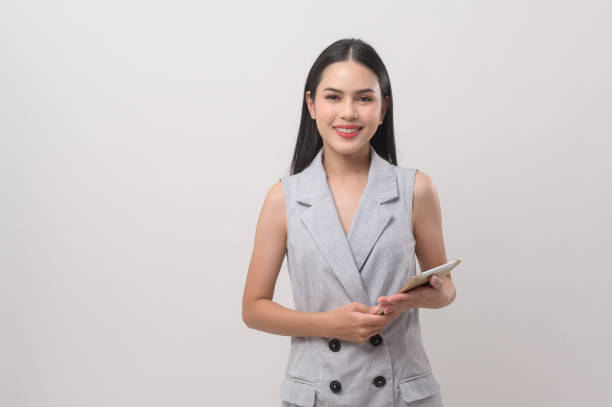 istock Beautiful woman using tablet over white background, technology concept. 2148709284
