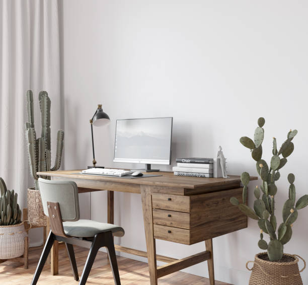 istock The interior of a home workplace or office in a modern style with big cactus. 2148709423