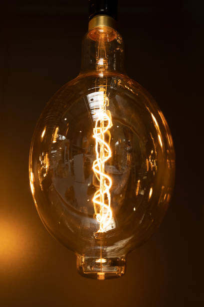 istock Designer LED lamp with a store reflected on it glass 2148710788