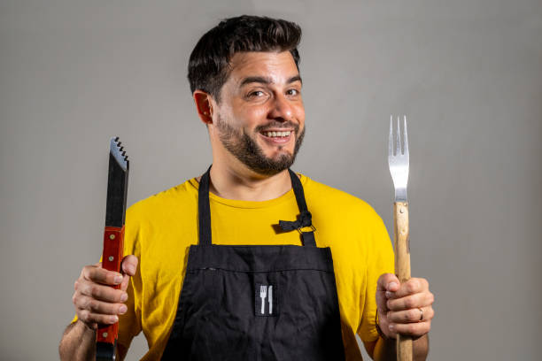 istock Young man ready to have a barbecue 2148710973