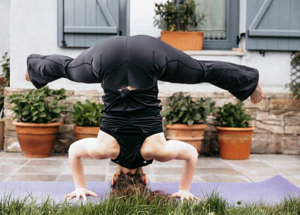 istock Advanced yoga balance and flexibility pose. 2148711170