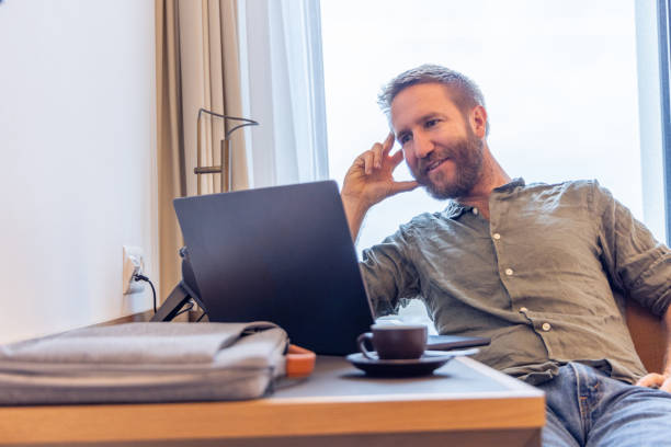 istock A happy man working from home 2148711188