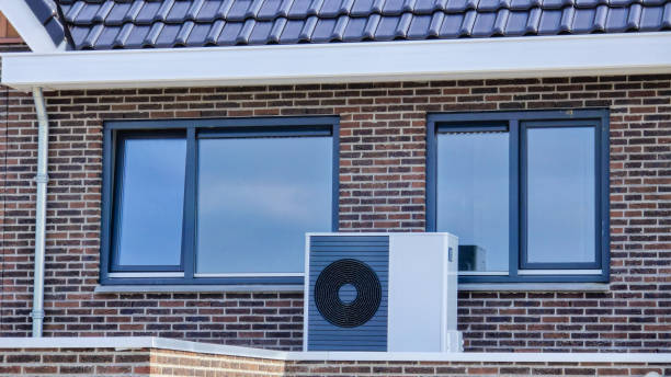 istock air source heat pump unit installed outdoors at a modern home with bricks in the Netherlands 2148712868