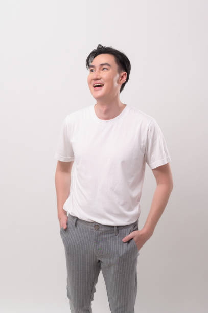 istock Portrait of young asian man over white background studio. 2148712950