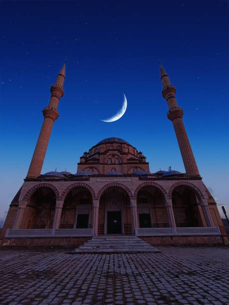 istock a mosque with a moon in the background and a moon in the sky. 2148714507