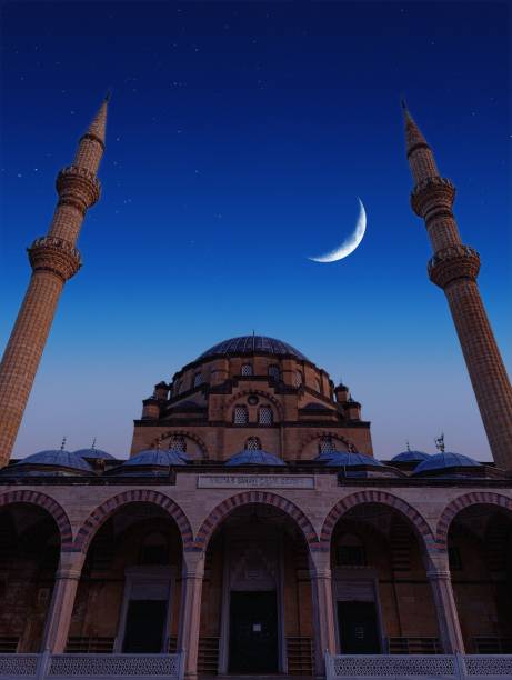 istock a mosque with a moon in the background and a moon in the sky. 2148714524