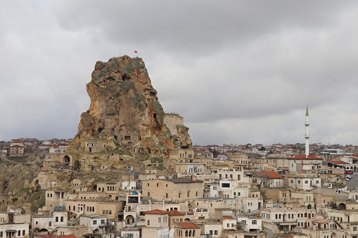 View of the Pigeon Valley in Cappadocia, the fairy chimneys and the Uschisar Castel in Turkey