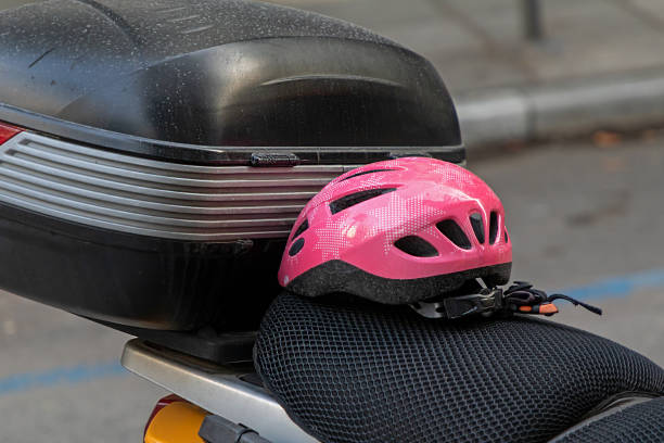 istock Small pink helmet on seat 2148720809