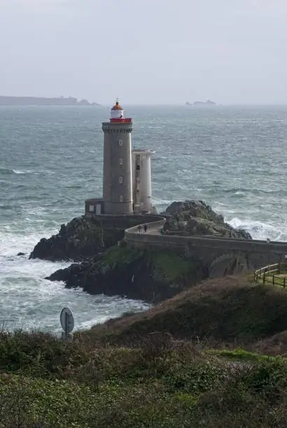 Plouzane, France - Apr 6, 2024: The Little Minou Lighthouse (Le Phare du Petit Minou) is a coastal lighthouse located at the west of Brest. Selective focus