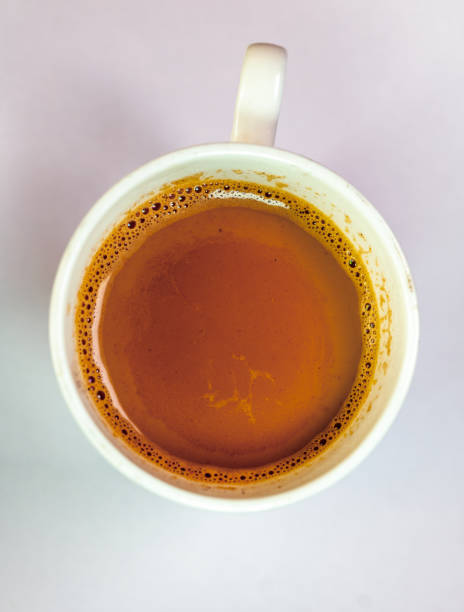 istock Cup of coffee on a white background top view closeup 2148722406