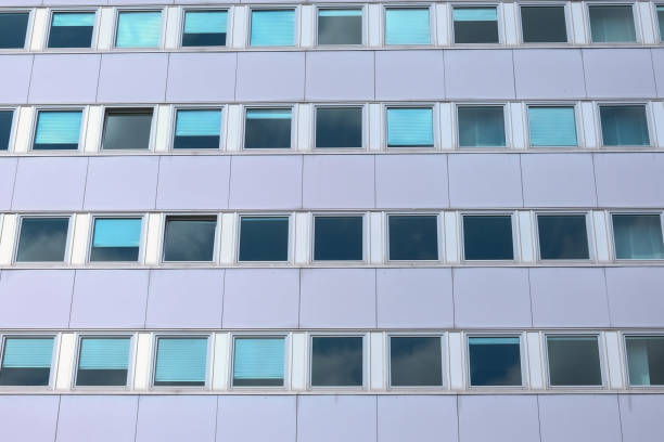 istock facade of an modern large house ,wall with windows 2148722558