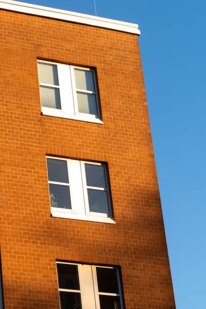istock facade of an modern large house ,wall with windows 2148723225
