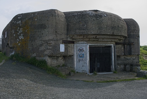 Granville, France - Apr 14, 2024: German battery built at Pointe du Roc during Second World War. Sunny spring day. Selective focus