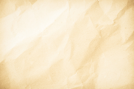 Old paper vintage texture surface for background. Recycle pale brown paper crumpled texture, Cream color recycled kraft paper texture blank with copy space for text.