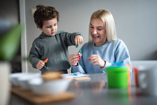 istock Mom develops the creative side of her child 2148724101
