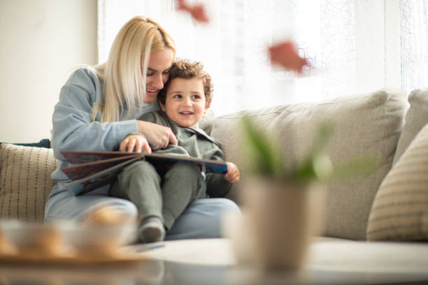 istock Young mom reading to her little boy 2148724262