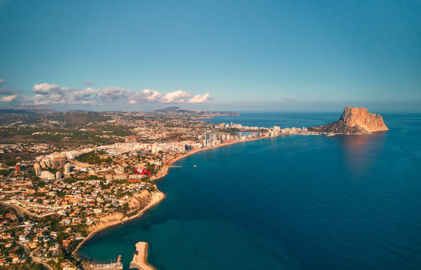 istock A serene lake meets a distant city under a vast azure sky 2148725698