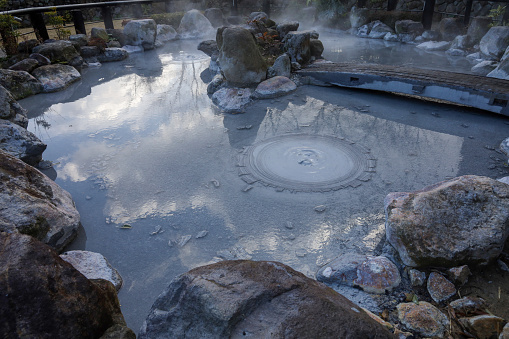 Oniishi bozu jigoku is landmark in beppu,Japan. the gray mud pool